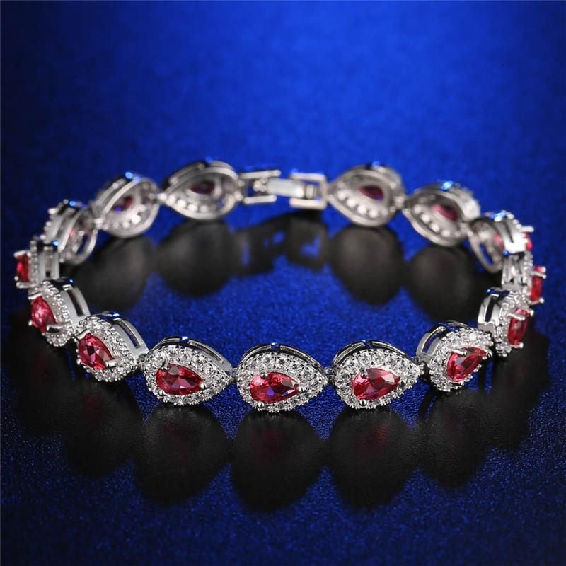 “Saditty” Silver Rhinestone Encrusted Red Gem bracelet