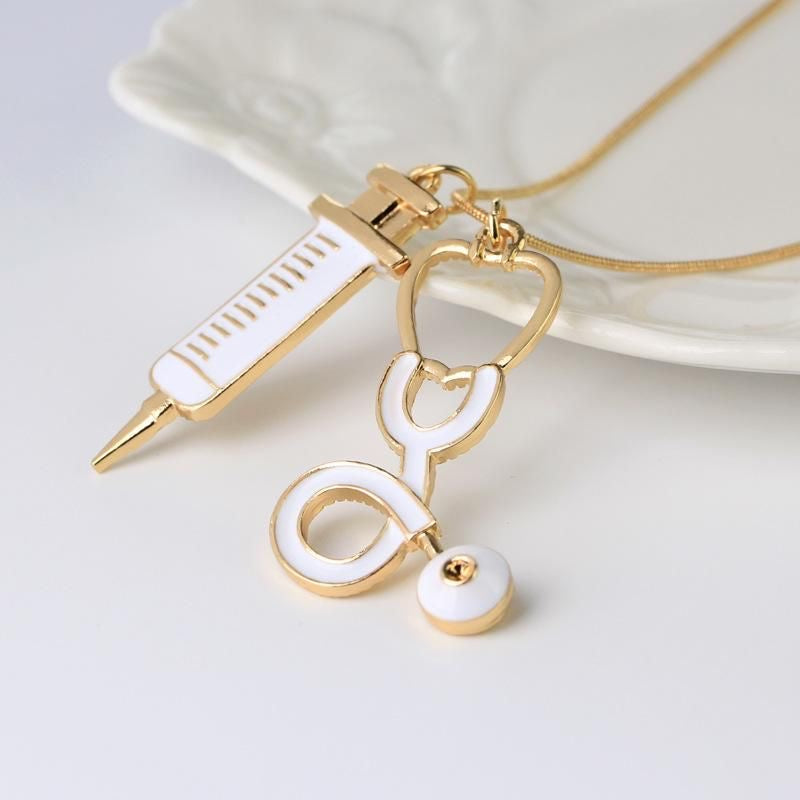 “Health Bae” gold plated Stethoscope syringe Necklace