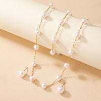 “Uppity” Pearl Necklace Bracelet and Earring Set