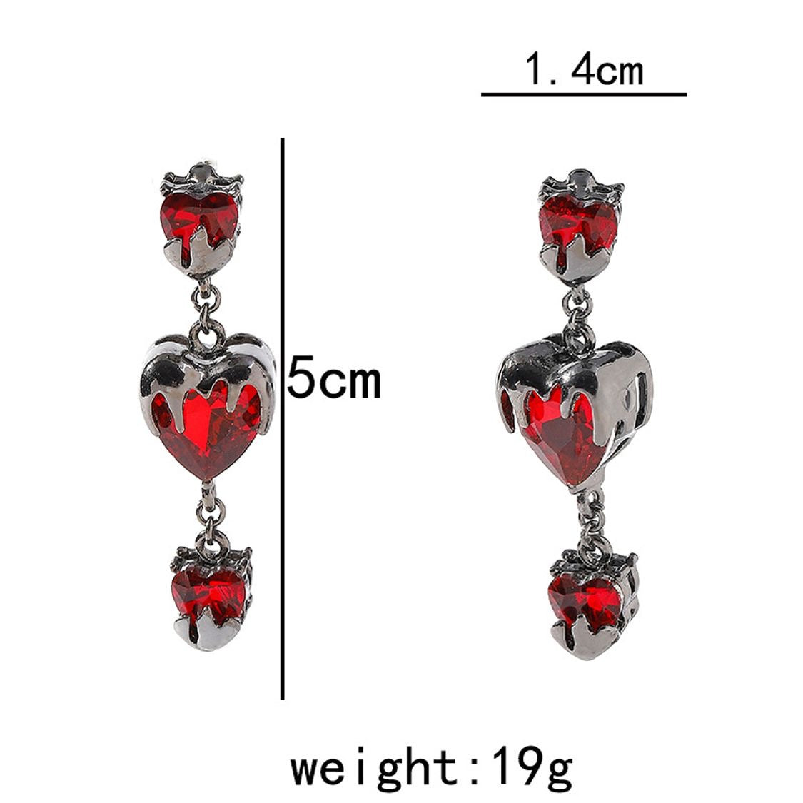 “Bleeding Love” Heart Earrings