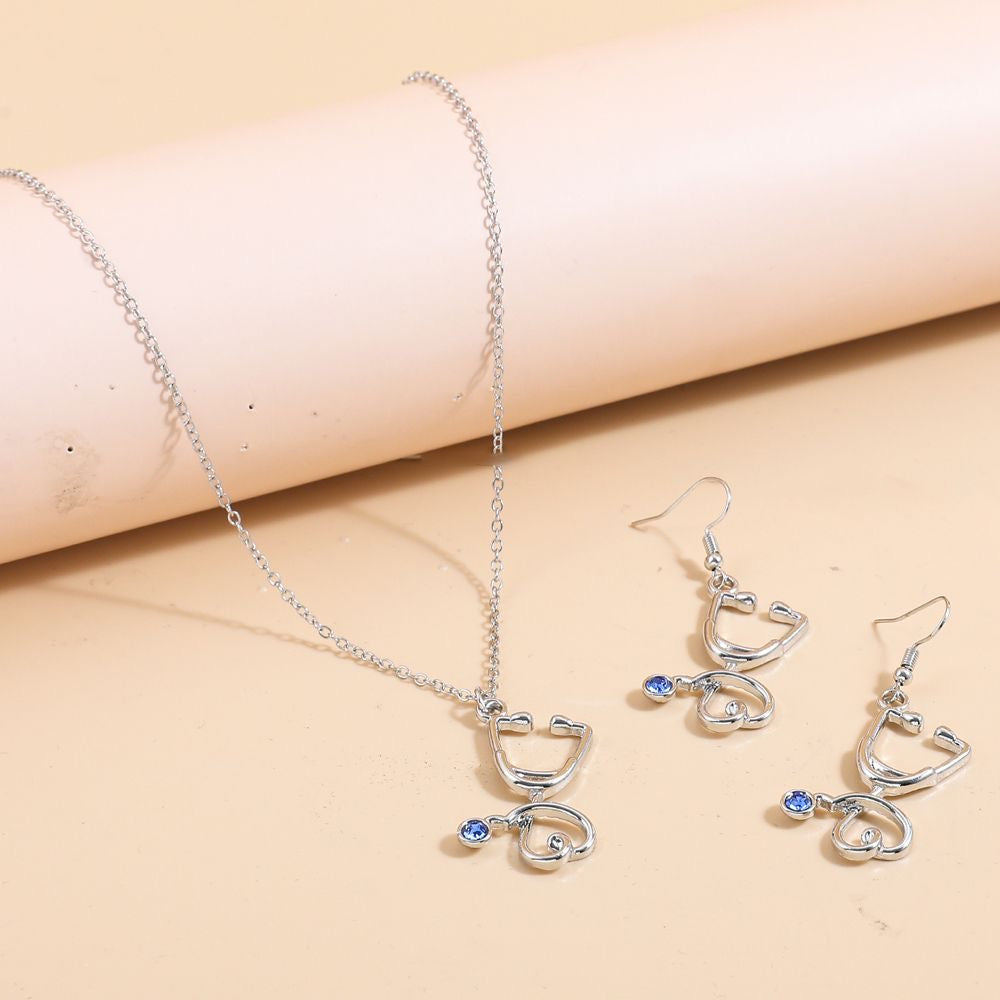 “Stethy Bae” Silver Blue Gem Stethoscope Earrings and Necklace Set