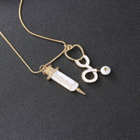 “Health Bae” gold plated Stethoscope syringe Necklace